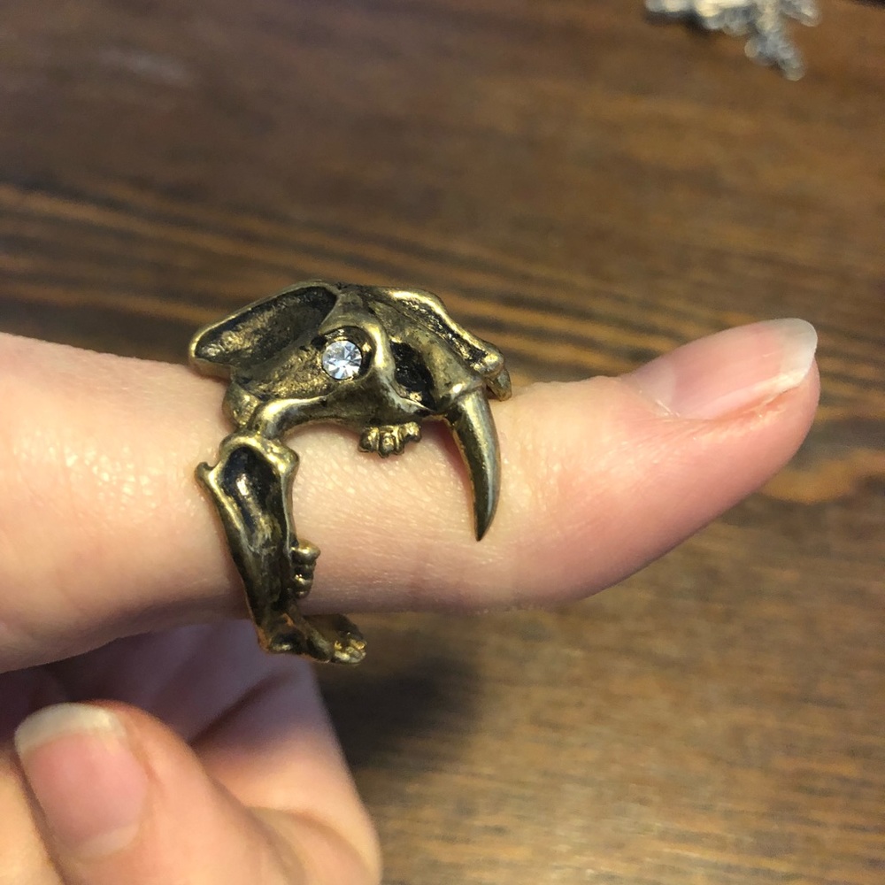 Brass sabertooth tiger skull ring